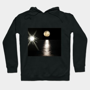 The sun with the moon on the surface of the sea Hoodie